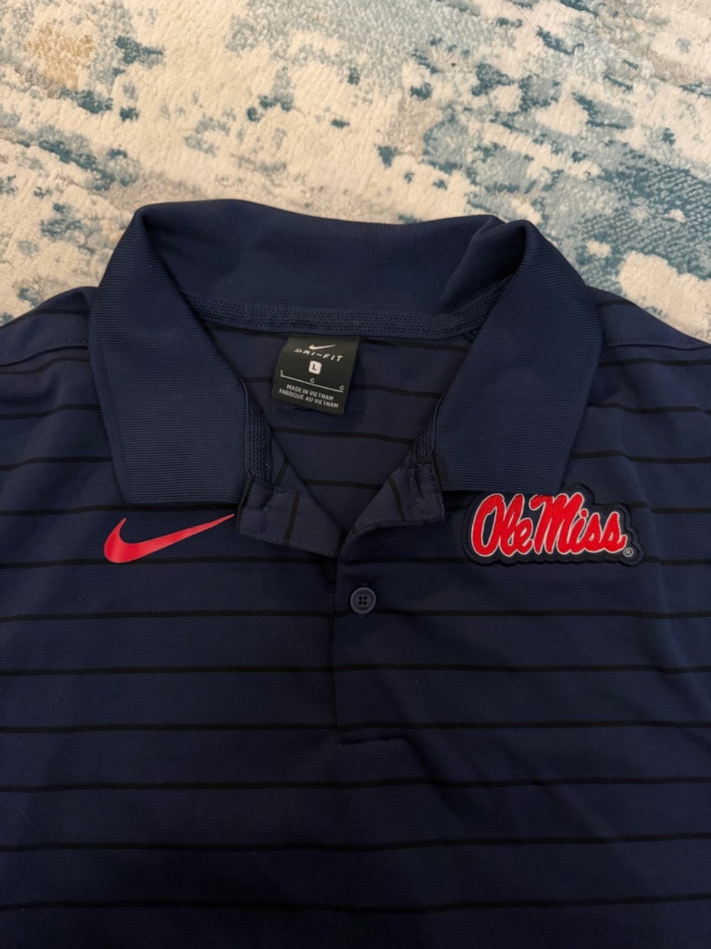 Nike Navy Polo with Red Ole Miss Script and Swoosh
